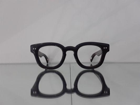 $1920, New York made and design; Buffalo horn glasses.