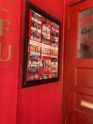 Framed photos by entrance.