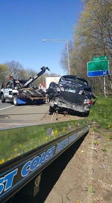 2000 Ford Wrecker at work.