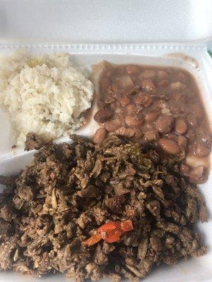 Steak fajitas with a side of rice and beans