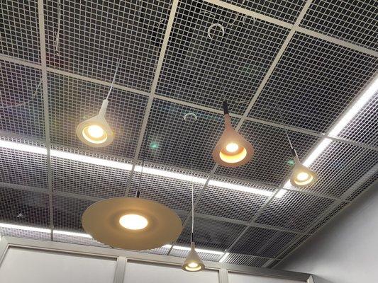 Mesh metal ceilings and light fixtures