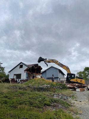 Before: We hired Kanway to remove the old house and garage from the property