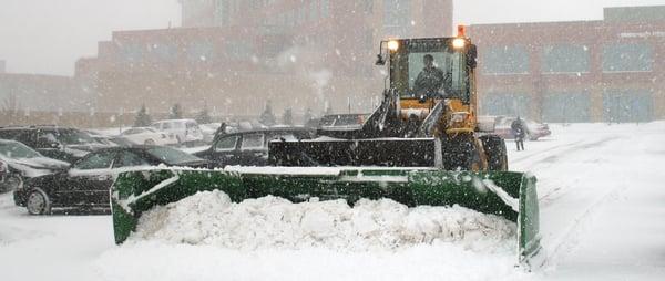 Sneller Snow Systems snow plow for snow removal in Grand Rapids and Lansing MI.