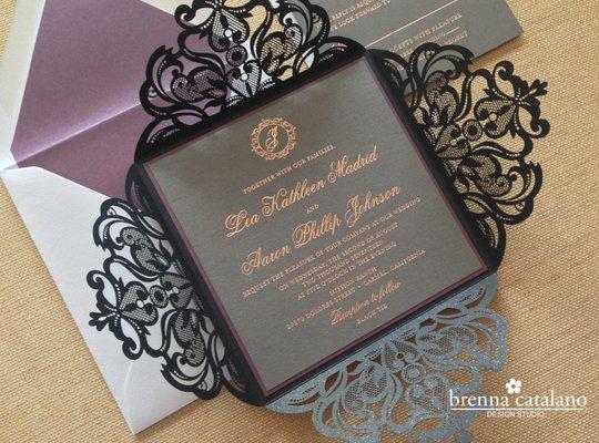 Laser cut invitation with rose gold foil printing.