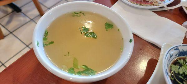 Complimentary extra pho broth