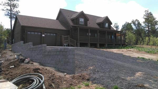 Doubled sided split face gray block wall.  All of our masonry walls are reinforced with rebar and grouted solid.