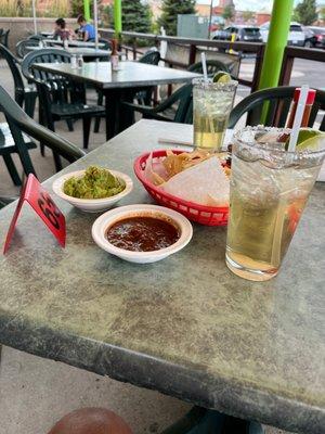 Margaritas and guacamole and chips.