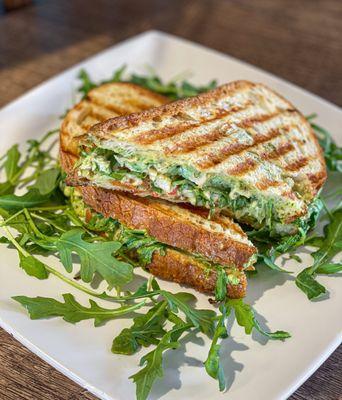 Grilled Chicken Panini, Roasted tomatoes & Red peppers, Mozzarella, Arugula, Basil pesto aioli.