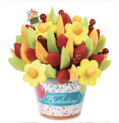 Perfect arrangement to say happy birthday!! Delicious fruit design in customizable container.