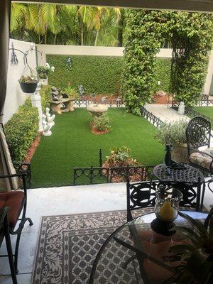 Artificial grass and boxwood ivy Patio area