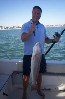 Catching Bull Reds with Brag and release fishing charters