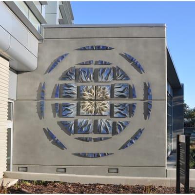 Blue Ripple Mandala, handmade, sgraffito-carved, ceramic wall tile installed at Chabot College, Hayward, CA, 2012