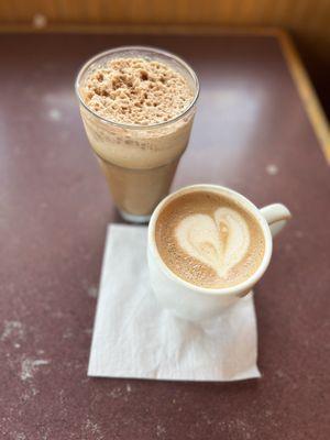 Cafe latte with foam art and large frappe with (lacking) coconut and chocolate flavorings, with oat milk