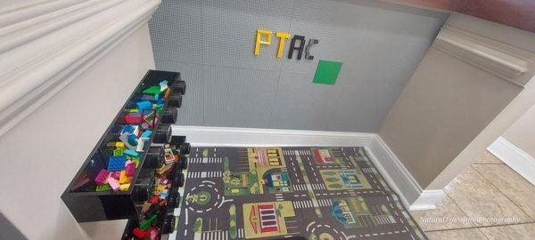 At Precision Tune Auto Care and my inner child was happy to see this Lego play area!