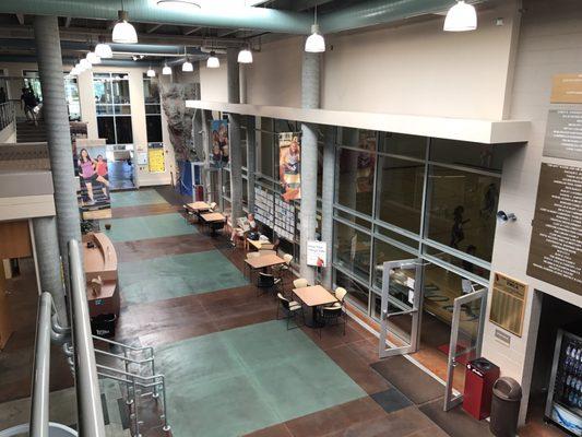 Looking down into the atrium. Basketball to the right and child watch straight ahead.