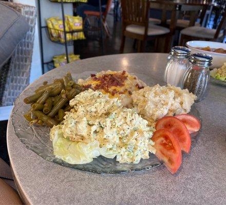 Pick 4 option: chicken salad on lettuce, green beans, garlic mashed potatoes, potato salad & tomato slices.