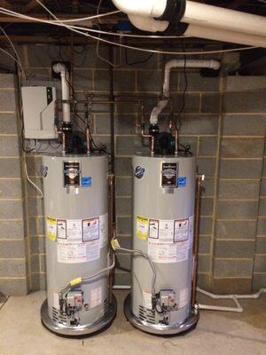 Water heater install-two 50 gal water heaters in a residential home.