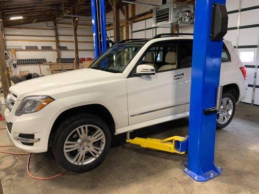 Mercedes in the shop getting four new Michelin tires