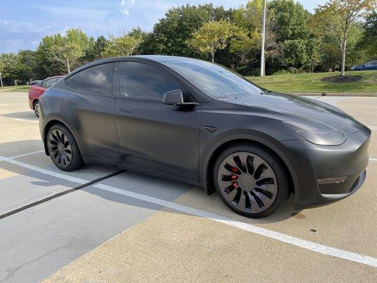 Model Y Performance with matte black PPF, ceramic coating, window tinting, and headlight/rear light tinting.