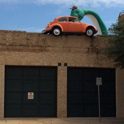 downtown Abilene. Also know as the Story book capital of America. Just look up and you might see this full sized VW bug.