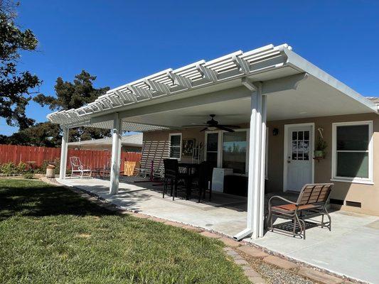 patio cover custom cut to match with curve of the concrete