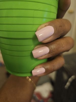 Light pinkish manicure.