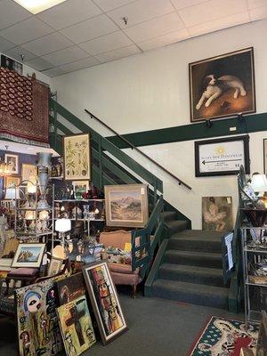 The staircase to the right of the door as you walk in the antique store.