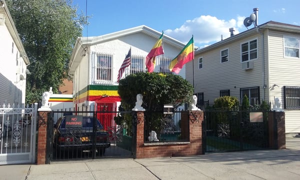 Look for the house with the flags!  Dr. Selassie's office is in the basement suite.