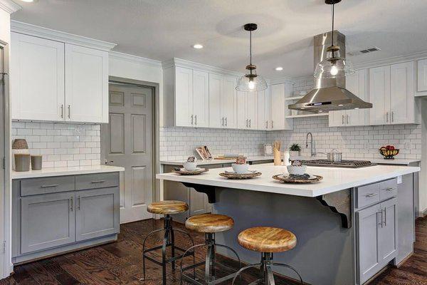 This kitchen was in collaboration with PM Renovations
 White quartz countertops.