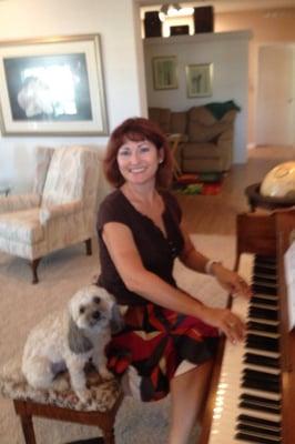 Teaching piano at my student's house.