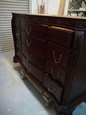 12 drawer dresser with dark stain