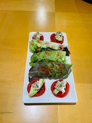 Raw Platter: Avocado Sliderz and raw lettuce wraps with sliced veggies inside