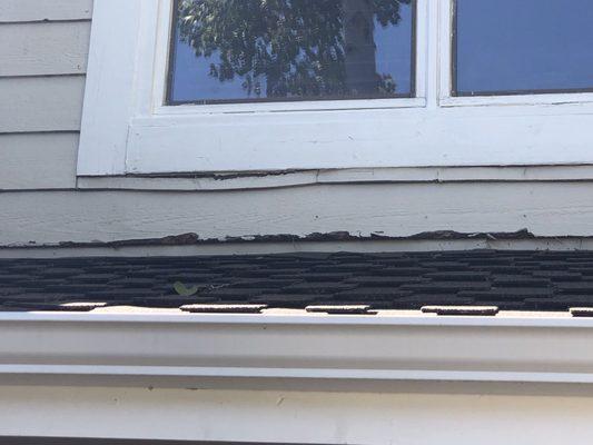 This damage continues around the entire house at every roofline. The house was painted before the roof was replaced