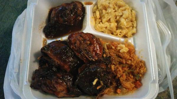 Jerk chicken, yellow rice, and Mac n Cheese. I also got the CRACK TEA!