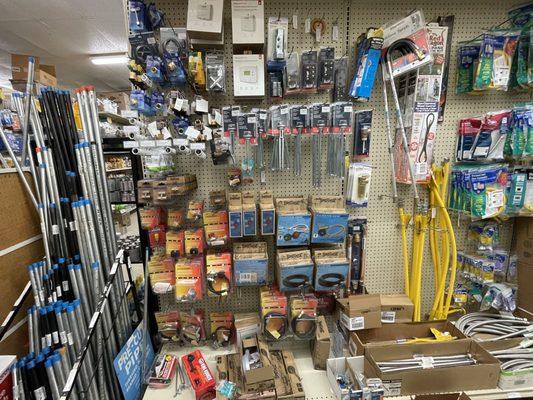 Water heater replacement thermostats and heating elements plus plumbing tools.