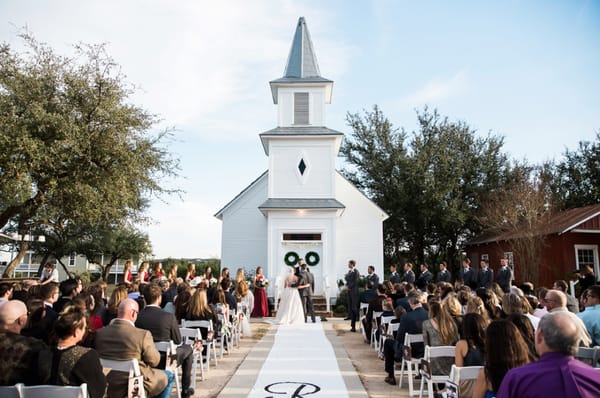 One of our unforgettable Main Street ceremonies with the Little Chapel as a backdrop at Star Hill Ranch