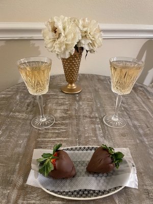 Add champagne and chocolate strawberries upon arrival