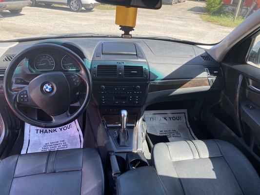 2007 BMW X3 on Sam & Tru Auto dealership parking lot