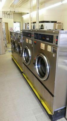 These are some of our very large machines for very large comforters. They also accept credit cards.