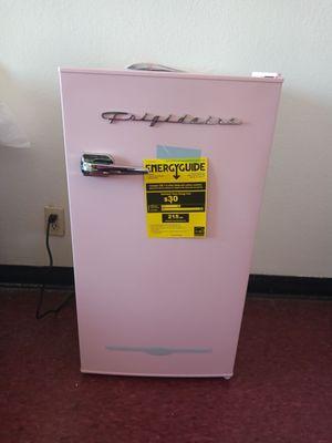 Chiji's pink mini-refrigerator