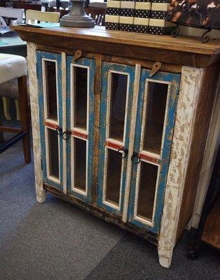 Painted cabinets with a distressed look is sure to be a favorite piece in your kitchen.