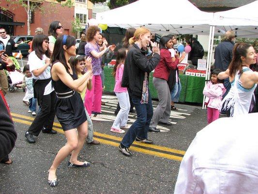 Zumba with Sheila does a Mother's Day Flash Mob at the downtown Campbell farmer's market.