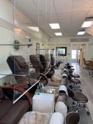 New clear panels around the pedicure chairs for safety of our customers and staff.