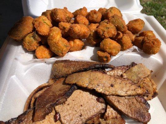 A football field of fried okra and smoky brisket