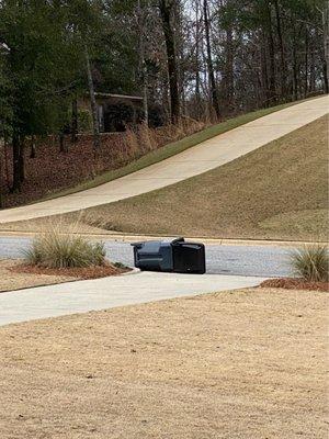 Trash cans are laying down all over the community. Maybe hire someone to follow the truck routes and clean up their mess?