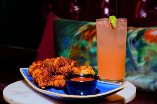 Jumbo Chicken Wings and a cocktail.