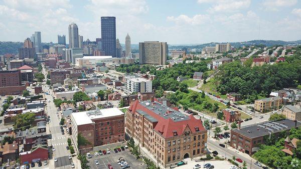 5th Avenue School Lofts with Downtown Pittsburgh in the Background.