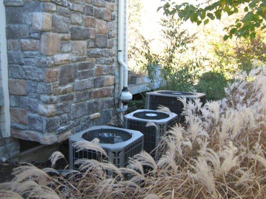 A radon mitigation fan hidden with the other utilities, keeping it out of sight while protecting your family