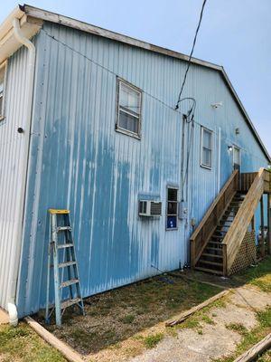 Commercial oxidised metal building resoration