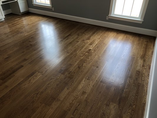 Newly refinished floors stained "Special Walnut."